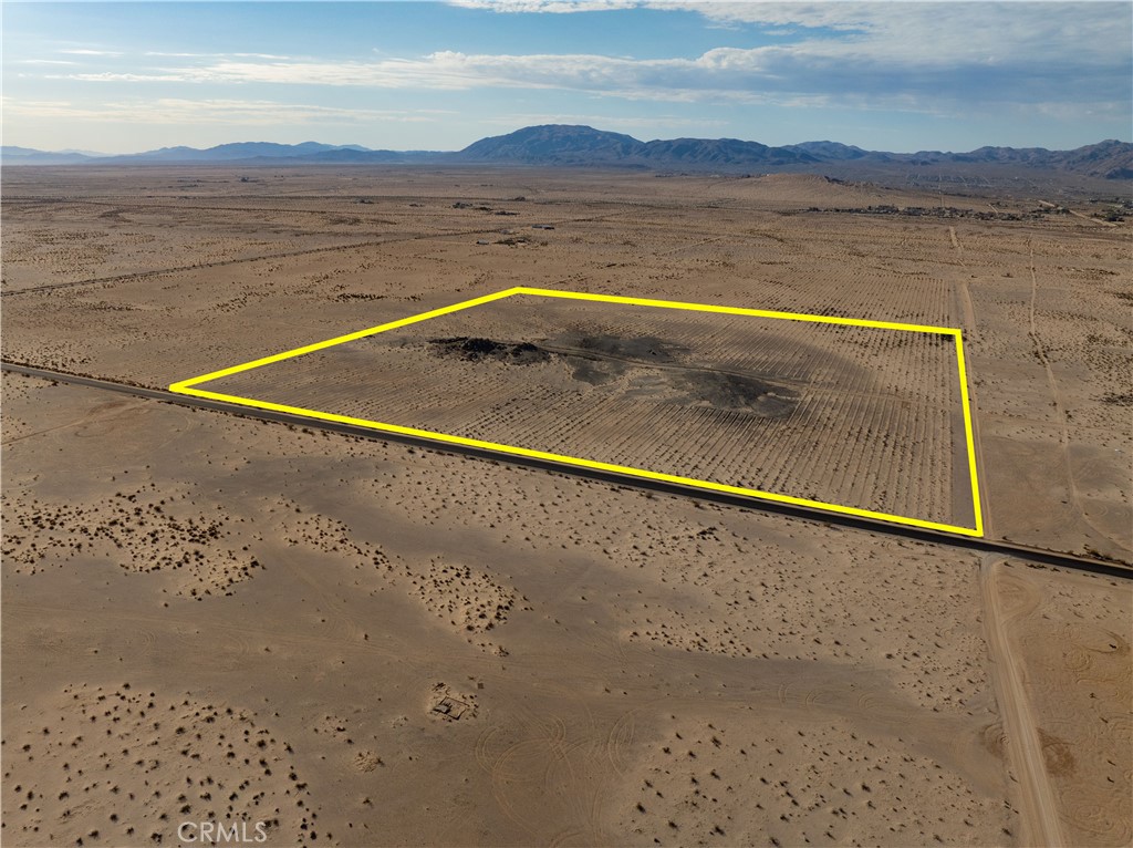 Nestled in the scenic landscape of 29 Palms, this remarkable 37.57-acre parcel of land offers a unique blend of natural beauty and practicality. Characterized by striking rock formations and sweeping vistas, the property is a visual feast, perfect for those seeking tranquility and inspiration in nature. Accessible via a well-maintained paved road, it features an existing well, ensuring a reliable water source while utilities are conveniently located nearby, making development straightforward and efficient. Additionally, its proximity to the 29 Palms Marine Base adds an extra layer of appeal, providing potential for investment or personal retreat in a vibrant community. Whether you're envisioning a private sanctuary or a future project, this parcel is a canvas ready for your dreams.