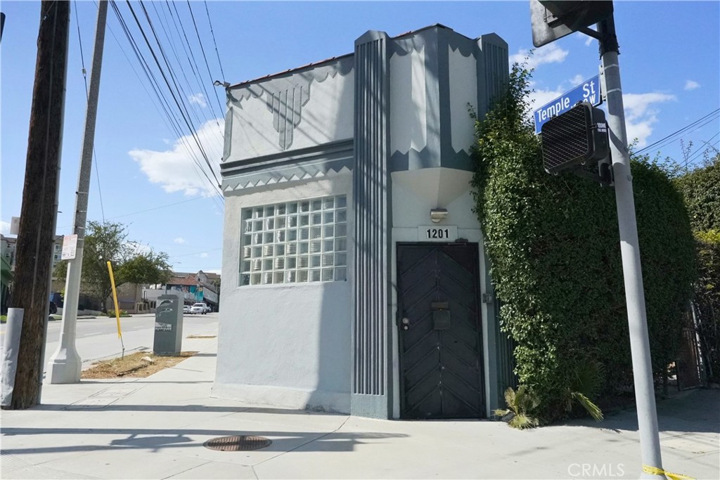 Located at the intersection of Echo Park and Downtown Los Angeles, 1201 W Temple St offers a prime leasing opportunity with 1,766 square feet of versatile mixed-use space on a 5,409 SF lot. Zoned LACW, the property allows for commercial, office, and residential uses, making it ideal for creative professionals, boutique retailers, wellness practitioners, medical offices, or live/work concepts (subject to city approval). This high-visibility location along Temple Street provides strong signage potential and easy access to the 110 and 101 freeways, while being just minutes from DTLA, Chinatown, Echo Park, and Silver Lake. The surrounding area is vibrant and rapidly evolving, with new developments, popular cafes, and cultural landmarks enhancing foot traffic and community engagement. The property features a flexible layout that can be tailored to suit a variety of business needs, with ample street parking and nearby public transit options providing additional convenience for clients and customers. This is a rare chance to position your business in one of Los Angeles’ most dynamic neighborhoods—contact us today for lease terms and showing details.