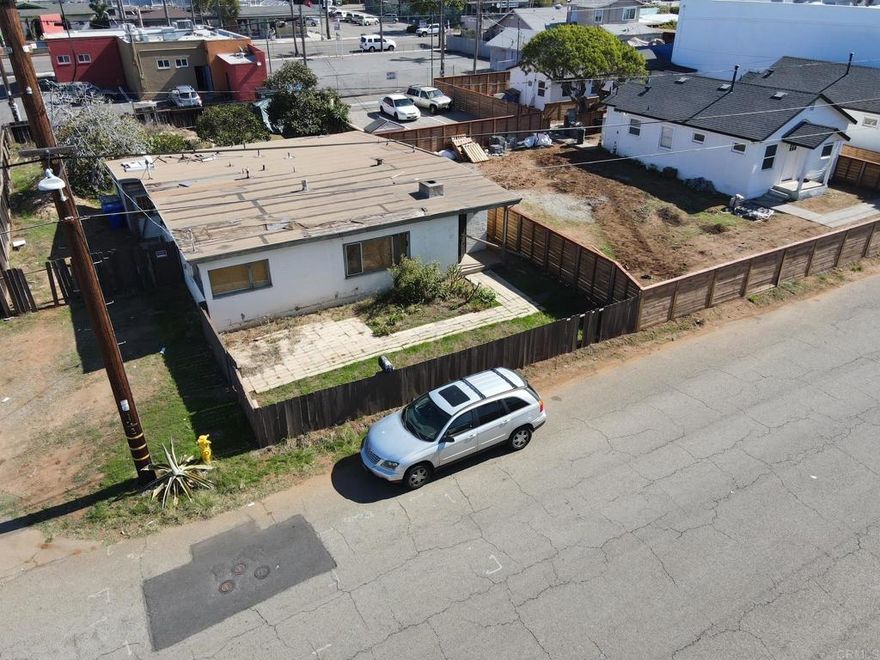 DEVELOPMENT OPPORTUNITY! Contractor’s special. Motivated seller!  This incredible deal will go quickly. You do NOT want to miss the opportunity to secure a highly-sought, Oceanside coastal location.   Ideally located 1 block WEST of S Coast Highway, approximately 5 blocks to the beach, and zoned C2. Zoning allows for mixed-use commercial development. Architectural renderings for mixed use/4 residential units convey with the sale! Renderings highlight ocean views from upper levels, private rooftop decks and mixed-use design. The large, 5,168 sq ft corner lot offers easy access to S Coast Hwy, and major freeways I-5, highway 76 and 78.   This project is just beckoning for the right buyer who wishes to use their creativity and turn this lot into a true diamond in South O! South Oceanside in particular, is a hub of eclectic small businesses to include artisanal California coastal eateries, craft breweries, small batch coffee roasters, vintage boutiques, handmade-goods shops, rejuvenating yoga and wellness spots and more!