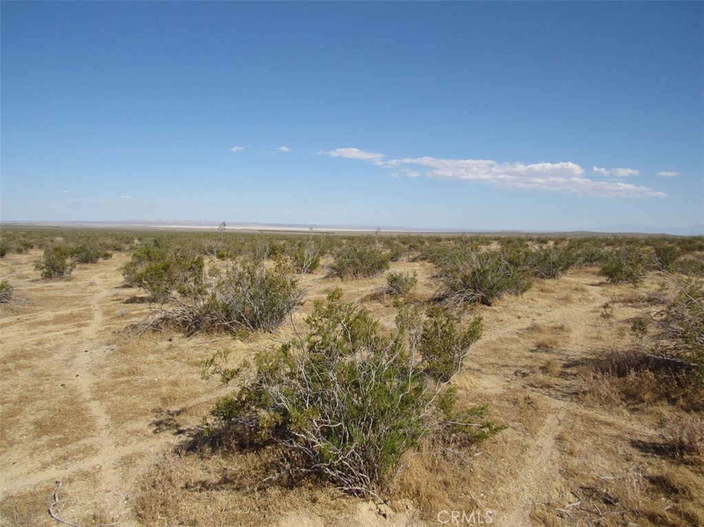 There is not an address associated with this parcel. What is reflected is the Parcel# of 469-211-22-00-9 which is +/- 2.51 AC. Zoning is PL RS MH. Located in the area of Cantil which is Unincorporated Kern County.