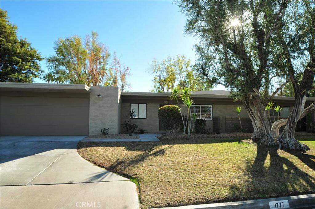 Relax and enjoy the year around Palm Springs sunshine at this nicely remodeled mid-century contemporary condo. Designed by Donald Wexler. This Sagewood community condo is located in central Palm Springs, close to the famous Palm Canyon downtown strip, aerial tram, spa resorts and casinos. Fresh interior paint, new wood laminate flooring through the open living areas, a new kitchen with Shaker style cabinets, granite counter tops, and vouchers for new stainless steel stove, micro/hood and dishwasher provided at COE to complete the kitchen. New granite, framed mirrors, fixtures and tile are in both bathrooms, and new gorgeous carpet in both bedrooms. There is also a laundry area and direct access to a shared garage. You’ll love relaxing in the privacy of the large enclosed patio with a gate to one of 3 pools and spas, just steps away. Tennis courts and lush greenbelts complete the oasis. Come live the amazing Palm Springs life!
