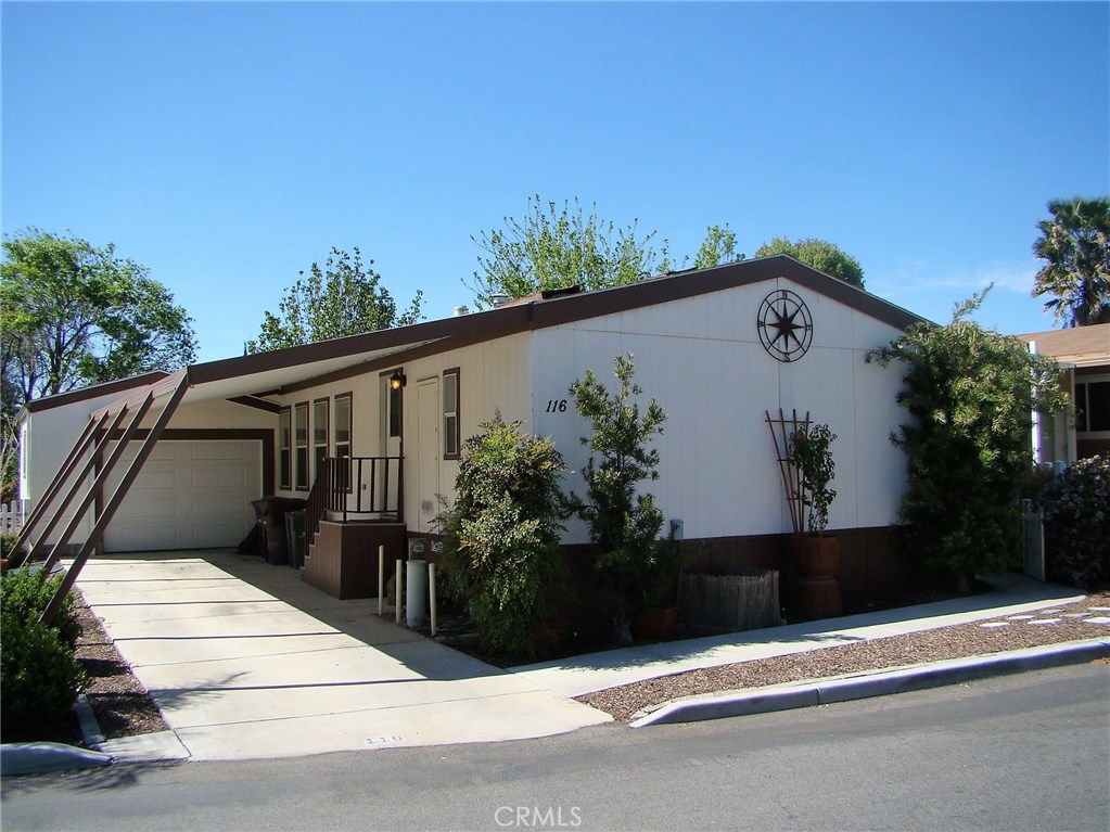 Pride of ownership. This home is the only 4 bedroom with a one car garage in the park. Very nice view lot. This home shows great. Owner has done a few upgrades including all appliances, new awning cover on entrance side of home, removed most cottage cheese from ceiling and has been freshly painted. They have added new water heater and redid the landscaping. Sky-lighted kitchen and remodeled bathrooms make this home very comfortable. Nestled on the far end of park with city view make this a great opportunity for the right family and it's in one of the most sought after parks in the IE.