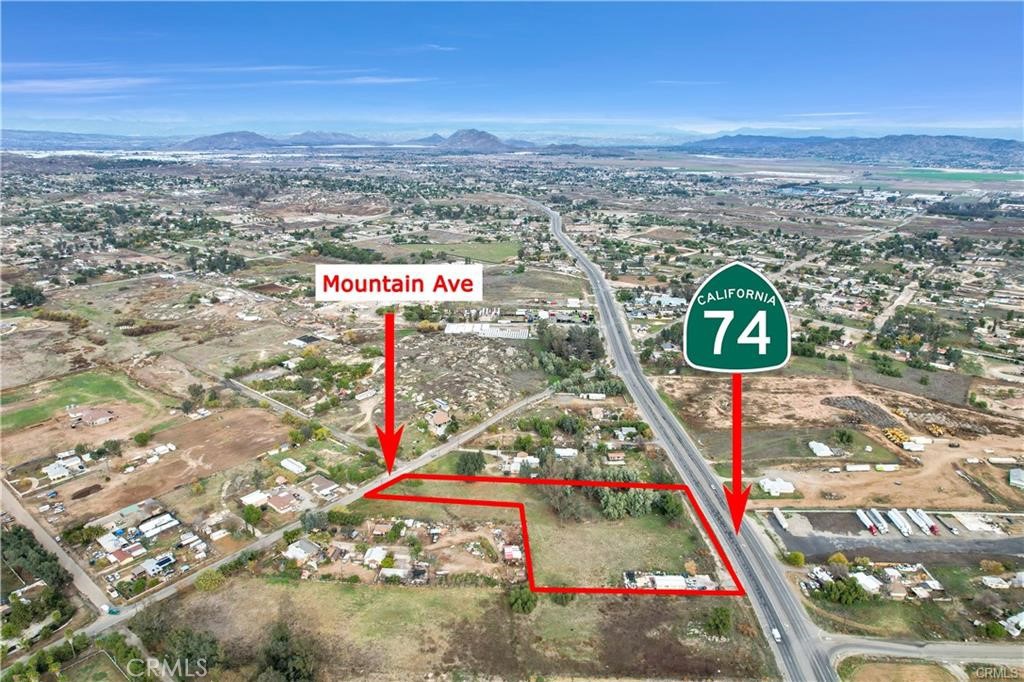 2 Beautiful flat parcels being sold together totalling 1.78 Acres with 165 feet frontage on Highway 74 and 85 feet frontage on Mountain! Zoned by the County for Business Park Commercial, but you can build a home, have a manufacture home or two, or build a business, or both! It is a very good investment PERIOD to hold or build. It is in the path of development, if you check with the county they are turning all Highway 74 in Perris Commercial, we are priced competitively! Our parcels are already Budiness Park Commercial, but homes or farms/ranches still allowed!