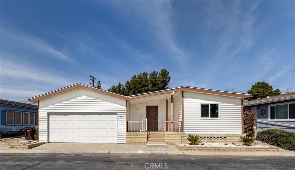 Don't miss this newly remodeled home in Banning Estates a 55+ Community This beautiful home features new waterproof laminate flooring, new paint inside and outside, New roof, New windows, New Washer and Dryer, Completely remodeled Kitchen with new cabinets, new stove, dishwasher and microwave. Both bathrooms have new vanities and mirrors with refurbished shower and bathtub. There is no land lease in this community because you own the land.