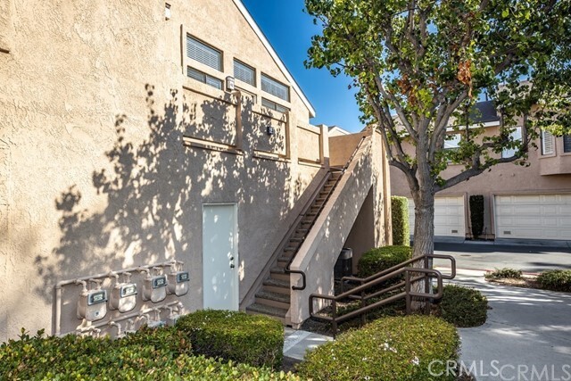 Welcome to this beautiful resort-style community! This dual primary suite, two bedroom condo features brand-new wood vinyl flooring, fresh carpet, updated paint, and more. The home offers exceptional privacy with no neighbors above or below, along with high ceilings and over sized windows that fill the space with abundant natural light. Each bedroom includes an en-suite bathroom and double closets. The remodeled kitchen boasts new appliances and granite counter tops. Enjoy partial views of the city lights from your spacious, private balcony. Additional features include an in-unit laundry and ample storage, along with a one car garage.
