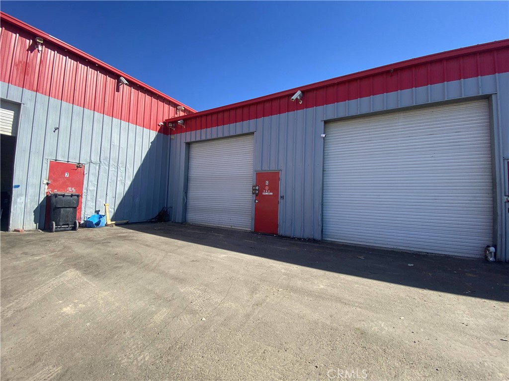 ±1,160 SF Industrial flex-space unit inside a larger industrial multi-unit building. Unit #6 has an automatic 14' roll-up door and a service door in the front. Inside is an open space that leads into a hallway with 2 large back rooms, IT closet and restroom. The back rooms are fully built-out with upgrades including tile, baseboards, white cabinetry, safes, and ventilation. The rooms are also wired for cameras and security. Overall a good layout for multiple busineses such as automotive, light manufacturing, warehouse, etc. Other tenants within the site include automotive repair, car audio, storage and more.