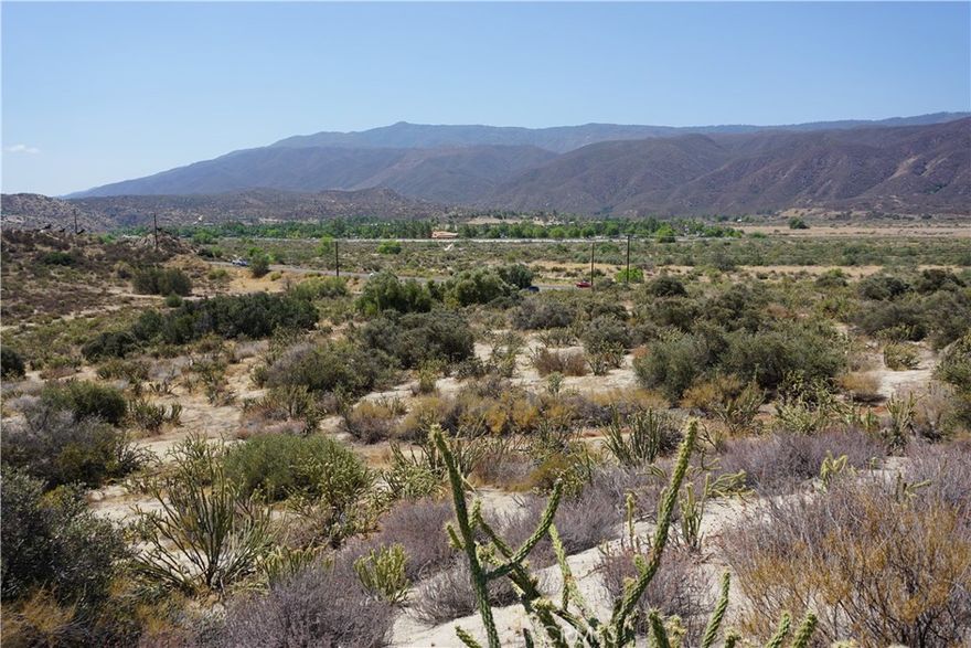Price Improvement!  So many possibilities for this amazing propery with frontage on Hwy 79, easily accessible and mostly usable 15.2 acres.  Build your dream home, plant vineyards, or subdivide and make a small development of homes. Adjacent to the Aguanga store and post office, in the path for possible future commercial.  Just east of Vail Lake and Temecula Wine Country. Close access to Mountain Center, Warner Springs, Julian, and Idyllwild.  Jojoba RV resort and the Rancho California RV resort are nearby.  Just west of Anza Road/Highway 371, San Diego County line, and Emerald winery.  Only 25 minutes from the 15 freeway.  Take a look!