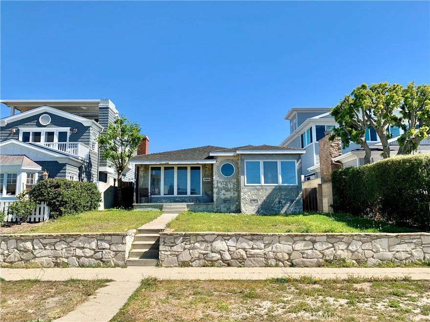 Once in a lifetime opportunity to acquire a rare, west-facing, ocean view property in the coveted South Redondo Beach enclave of the Avenues. Situated near what is known as the highest point around, this elevated flat lot incredibly provides ocean views from the ground floor, plus a peek at the Santa Monica Mountains. This street-to-alley lot allows for improved curb appeal of the home with the freestanding garage at the back of the property. And what a garage it is! Fit 4+ cars or even an RV and a boat in this massive, double door entry garage, surely the largest in town. Or convert part of it into an ADU, while still retaining plenty of garage space for parking. With this incredible location secured, the possibilities abound for how you will reimagine this property that has been loved by the same family for 48 years. The home was added onto many years ago so it offers an expanded floorplan that you could remodel to your style and even add on a 2nd story to maximize that ocean view. The front porch and yard beckon with a peaceful outdoor space for you to relax and unwind while feeling the ocean breeze, peeking at the ocean, and watching the sunset. Step through the entry with a whimsical porthole shaped window framing the first look at the ocean inside the home. The inviting living room is warmed by a fireplace and brightened by lots of dual-pane windows. Another opportunity to gaze out west to the ocean is in the dining room which opens to the sunny kitchen with plenty of storage space, and out to the wide side yard. Through double doors back inside, you will find a large center hall leading first to the full hall bathroom with dual sinks, abundant cabinetry, and a shower/tub combo. The 2 original bedrooms are sufficiently sized and complete with closets and windows. The 2 added bedrooms are larger, both with sliding glass doors leading out to the backyard, and 1 with a dedicated full bathroom making it the primary suite. Private and enclosed, the backyard has some grass and could be finished nicely with a patio. From the backyard, the oversized garage can be accessed by both a vehicle door as well as a pedestrian door. The current improvements have potential, however, the value is in the land. So if you would prefer to start fresh, build your dream home here instead! This is a sweet, idyllic block with lovely neighboring homes and considerable new construction redevelopment in the area. Fix up, add on, or tear down? The choice is yours, the time is now.