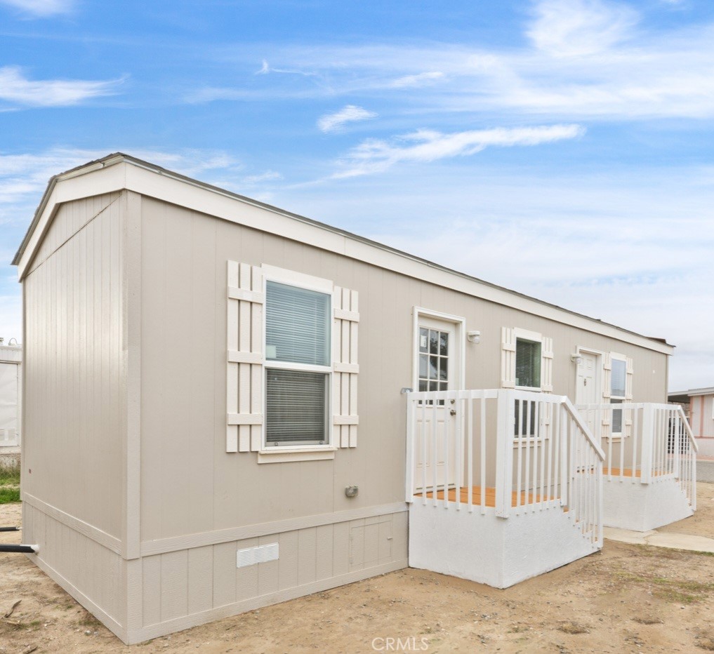 Gorgeous NEW manufactured home being built at the factory and scheduled to be delivered SOON to space #9! Nice, gated family park.