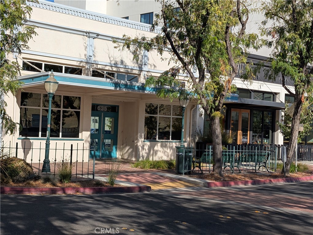 Capitalize on High Traffic and Strategic location of this Professional Office building in the center of Merced's Downtown renovation. Next to El Capitan Boutique Hotel (home of the coveted Rainbird restaurant) UC Merced Downtown Campus Center, Merced Civic Center, Historic Tioga Hotel, Mainzer Theater, and many Restaurants and entertainment venues. Features 3 roof HVAC units, Men's and Women's Bathrooms, Lobby and reception, large office, copy room, multiple storage rooms, Board room, small kitchen, and large meeting room wired for visual presentations. Lots of custom Oak cabinetry and the flexibility to be utilized for both office and retail use. Pre-opened with Peg from Transcounty Title