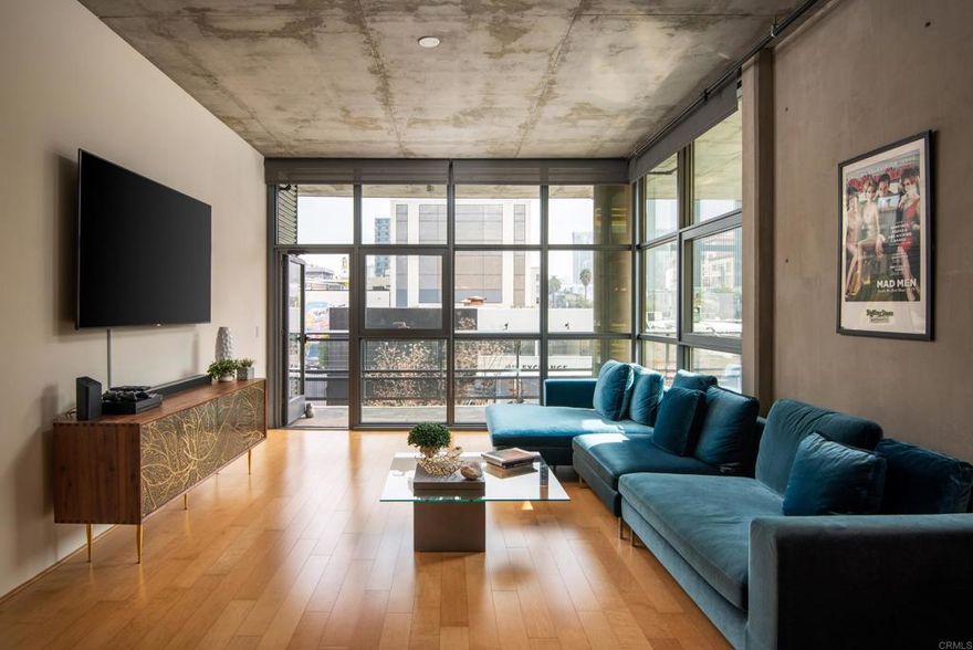 UNFURNISHED Little Italy gem! This second story unit has a wonderfully open floorplan with fabulous wrap around deck to enjoy the exceptional California weather.  Aperature is a security building sited in a PRIME LOCATION, tucked away from major traffic, but just within blocks of great restaurants, shopping, the weekend Farmer's Market, parks and public transportation. More spacious than most downtown condos, you'll love the wide rooms, high concrete ceilings, and spacious bedrooms with generous walk in closets.  Owner will consider pets with a deposit (at his discretion).  2 car parking is tandem.