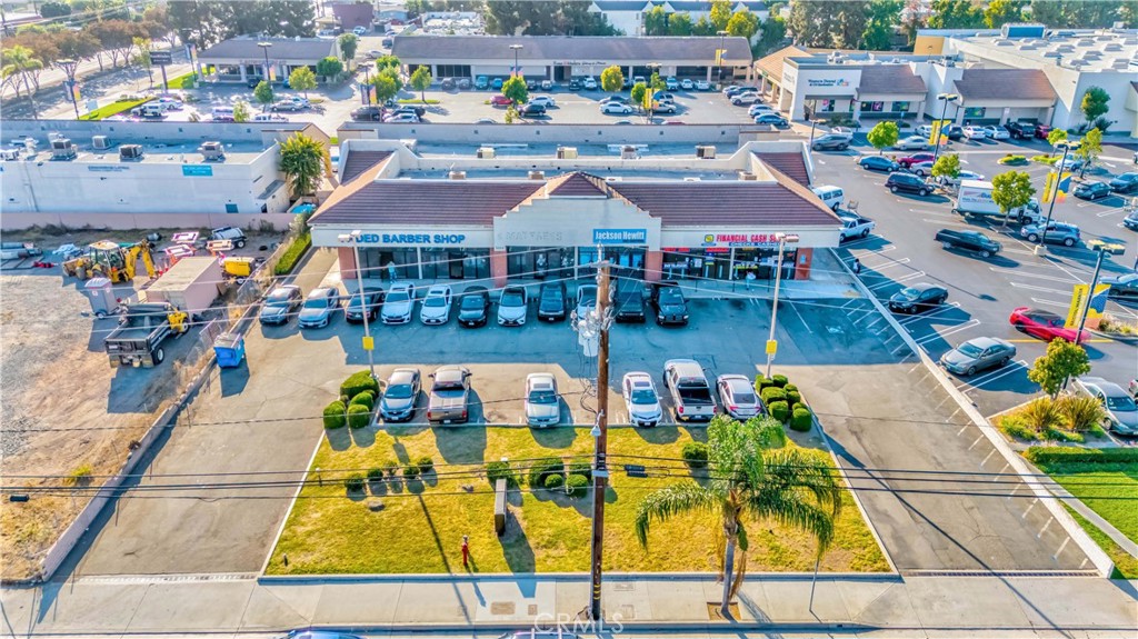 This well-positioned retail strip center of approx 4,596 sq of freestanding building, and approx 19,875 sq of land size (source: assessor), offers a great investment opportunity in a high-traffic location. Situated on a bustling commercial corridor in Santa Ana, stable tenants include a Jackson Hewitt tax service and a check cashing currency services. Building consists of total of 6 units, #1 thru #6, each unit is approximately 750 sq. Space #(A1),B(2) and C(3), was a barber shop, is current vacant. Space #D(4) is lease to a tax service and space #E(5) and #F(6) is leased to a check cashing currency services. Site is located near major thoroughfares and offering excellent visibility, the center benefits from a steady stream of customers. The property’s prime location, diverse tenant mix, and solid financials make it an ideal investment for those seeking long-term value in a thriving commercial area. City of Santa Ana has ongoing Bristol St widening project and front 14 feet has been eminent domained to the City for the City Project. (Source: City of Santa Ana) Bristol St widening project does not reflect the number of existing parking spaces of the subject.