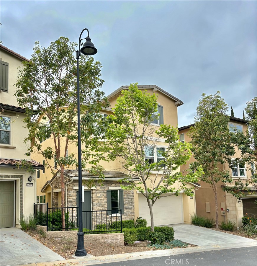 Located in highly desirable prestigious Southpoint gated community within Walnut school district, this upgraded luxury home offers open floor plan with gourmet kitchen crafted by Monogram stainless steel appliances, granite counter tops, walking in pantry, built in fridge, 6 burner stove, multiple function center island. One bedroom suite on ground floor! Master bedroom and 2 secondary suites are on the second floor equipped with all stylish upgraded granite counters, designer's tiles and vanities. The third floor offers a huge entertainment room, a full bath and sizable bedroom. Private yard is enjoyable for outdoor coffee time and dinning. This home is perfect for a big family or 3 generations! No need to mention how convenient to schools, shopping and transportation!