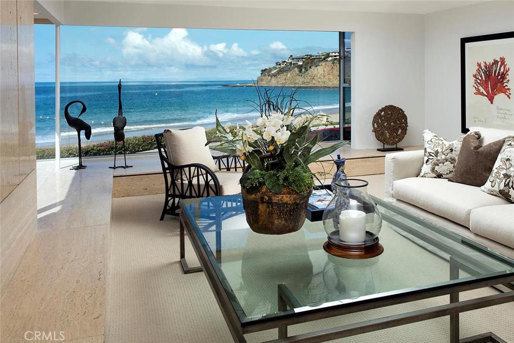 Once in a Lifetime Opportunity and open to the market for the very first time! Located on one of the best lots in the exclusive, guard-gated neighborhood of Emerald Bay, this home offers endless views of the Pacific Ocean. The secluded beach is exclusively set aside for the residents of Emerald Bay and provides a relaxing backdrop from nearly every room of the house. The community is packed with every conceivable amenity and ensures the ultimate in luxury and convenience for the homeowner. Some highlights from this peaceful seaside neighborhood include a heated pool and spa, six tennis courts, several parks and playgrounds, and a pristine natural setting alongside the Laguna Coast Wilderness Park. The oceanfront residence includes a master bedroom suite with panoramic views of the ocean and a spacious living room with a wall of floor-to-ceiling windows. Other notable features of this thoughtfully designed residence include a fireplace and a full bathroom off the attached two car garage as well as two other bedrooms with adjoining baths. Taking full advantage of its prime oceanfront location, this home is truly a rare and unique opportunity. It has been a treasured family home for many years and is an opportunity that will not last!