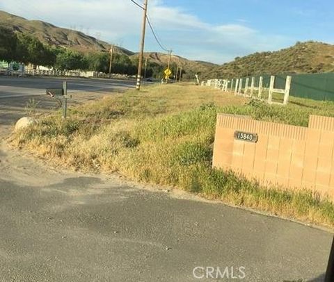 Photo of 15840 Sierra Canyon Hwy, Canyon Country, CA 91390 (MLS # SR25029576)