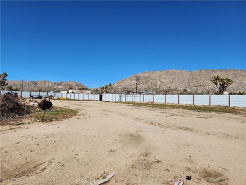 Photo of 7248 Scarvan Road, Yucca Valley, CA 92284 (MLS # TR24246159)