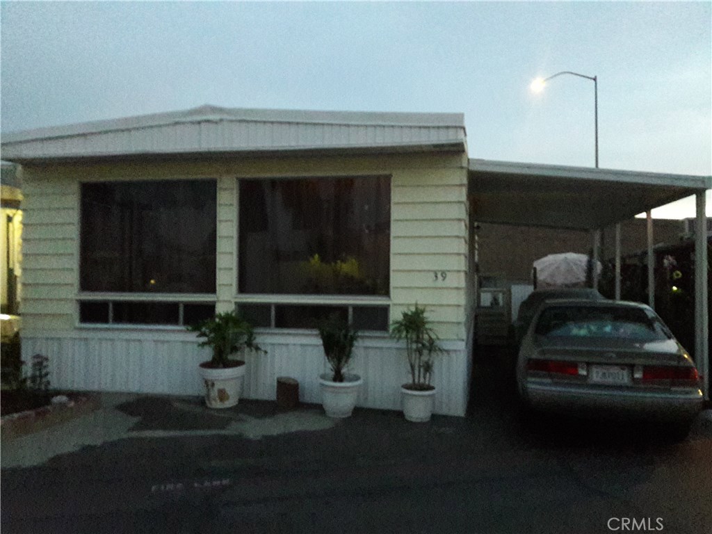 Wonderful and affordable mobile home in the Thunderbird Mobile Home Park of Garden Grove. Home has 3 bedrooms and 2 bathrooms plus a bonus room. The home is spacious and inviting. There is easy-to-clean vinyl flooring in the living area, dining area and kitchen. All bedrooms are ample and clean. Perfect starter-home for a family. Some features include: front garden area, washer/dryer hook-ups, built-in buffet table, porch, storage shed, fenced patio, ceiling fan, and large carport. The Thunderbird Mobile Home Park of Garden Grove is a popular, all-age family community and for all the right reasons. The park has amenities that are for the exclusive use for its residents. Centrally located close to freeways, parks, and walking trails.