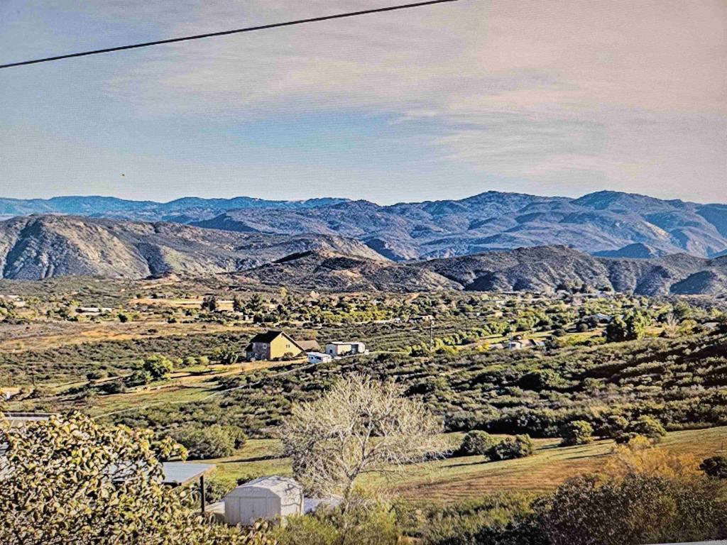 Incredible opportunity to own a 10 acre parcel surrounded by natural beauty and views. This property is the one to build your dream home. This can be your own private ranch where you can have your horses, barns, workshop, or plant trees and gardens. Country living with easy access to town, schools and shopping. Additional parcels also available