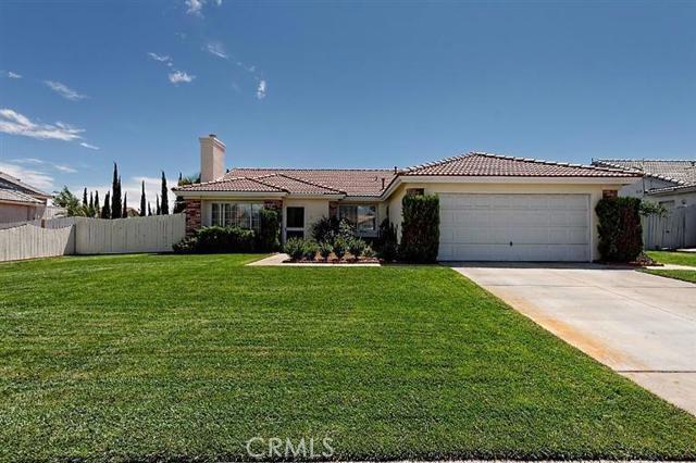 Welcome Home to this wonderful fully landscaped property! Beautiful move in ready home with a cozy fireplace for those chilly desert evenings in the living room. Open kitchen den area with lots of counter space and kitchen island. Master bedroom has double sinks. This home also boasts a large covered patio and mature trees in the. This home won't last long; it is ready for you to move in! Rent includes lawn maintenance. Association Amenities: None Special Features: Garage Door Opener