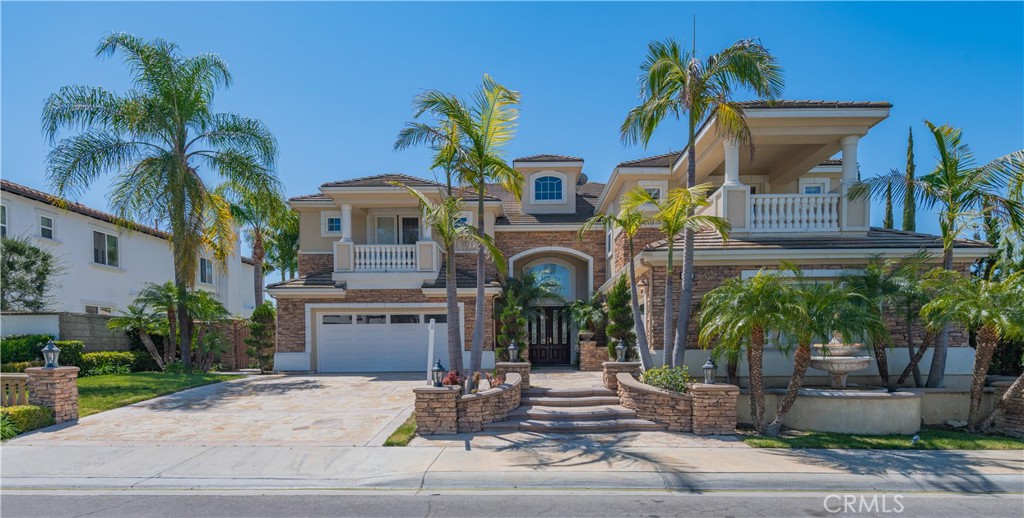 This home is Allencia Manor model built by Toll Brothers with hard to find Catalina views, the highest levels of luxury living, Featuring 5 large bedrooms including a guss room downstairs en suite, plus a bonus imtertament room, library, and exercise yoga room, this floor plan provides all parts of the family you needs. The Double beveled glass doors lead you into the grand entry with double iron staircases. Elegant Designer Crown Moulding is adorned across the ceilings throughout of this 5 star estate. The Gourmet Kitchen features 6 burner cooktop plus griddle, Double Ovens, warming drawer, Built in Refrigerator, and Built in Microwave along with beveled glass walk in pantry, those appliances are toll prother spencial choced. The extensively hardscaped backyard provides resort like amenities with covered loggia and outdoor fireplace along side the sparkling pool and spa with water features. A built in BBQ island, with bar top seating is conveniently located for entertaining. Outside you can also find a basketball area for the kids.Also walking distance to great yorba Linda High school.