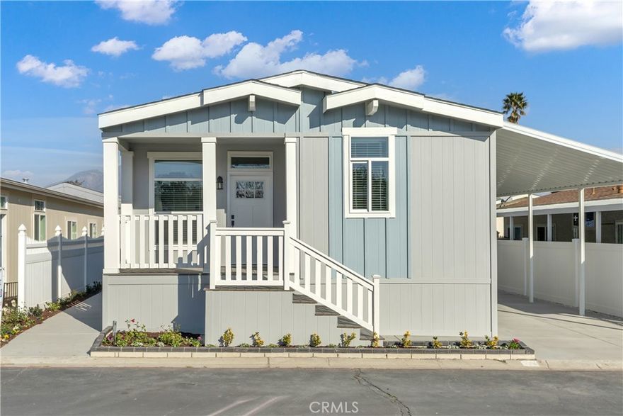 Discover this brand-new manufactured home in a welcoming all-age community in Ontario, CA. Enjoy a charming front porch—ideal for relaxing outdoors—and an open floor plan that connects the living, dining, and kitchen areas for a spacious, airy feel.



The kitchen features a central island, sleek stainless steel appliances, and plenty of room for cooking and entertaining. This thoughtfully designed home offers two guest bedrooms with ceiling fans and ample closet space, a full guest bathroom with a tub/shower combo, and a private master suite with its own en-suite bathroom for added comfort.



Perfect for families looking to create lasting memories, this home combines modern living with convenient access to local shopping, dining, and more.