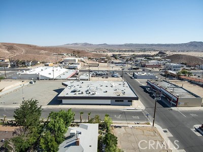 Rich in history as the original home to Barstow’s Route 66 central Grey Hound station with central location just off Main Street’s high traffic zone. Designated by the City to be within its preferred Downtown Business and Cultural District, and part of the city’s Route 66 Business Corridor Specific Plan to boost tourism and economic development in coming years. Recent announcement of the BNSF Barstow International Gateway coming to Barstow! will be largest Gateway in America promising more jobs and economic development for Barstow. Zoned ‘Commercial General’ with a plethora of uses including, but limited to retail, restaurant, brewery, event center, commissary, medical, non-profit and/or office space. Located in a Qualified Opportunity Zone, near revitalization efforts and new major chain business establishments (i.e., Dutch Bros Coffee). About 1,000 sq ft culinary kitchen, with large heat venting system and walk-in refrigeration system. The electrical is commercial grade with plenty of power for this building. The kitchen layout feeds to a large dining hall and cafeteria. Contains a formal entry, a retail show room, various outer room that can be used for office, administrative or classroom usage, wheelchair accessibility. Subarea 2 is primarily zoned C, with a small portion of vacant land located on the eastern boundary of the subarea zoned for light industrial uses. The DU Zone permits a combination of commercial and residential uses. Within this zone, a parcel or parcels that have a combination of residential and non-residential uses are considered mixed use. In the year 2019 Average Daily Traffic counts were obtained from the City of Barstow, County of San Bernardino, and Caltrans District 8 and post-processed to Year 2021 utilizing a 2% per year growth factor. A summary of existing traffic volumes related to the project site is: Main Street carries 12,900 vehicles per day between Barstow Road and First Avenue and First Avenue carries 7,500 vehicles per day north of Main Street.