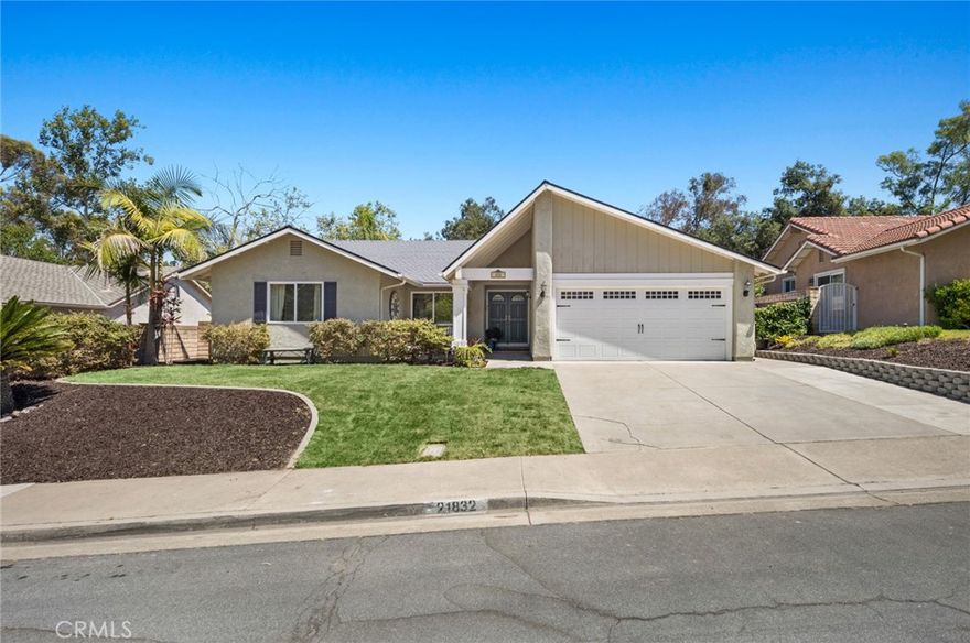 Welcome to this charming single-level home nestled in a peaceful cul-de-sac, offering a perfect blend of comfort and convenience. With four bedrooms and two baths, this residence boasts a spacious layout. As you step inside through the formal entry, you'll immediately notice the open floor plan that promotes a seamless flow between the living spaces. The heart of the home is a cozy living area, which effortlessly transitions into the dining space and kitchen, making it ideal for both everyday living and entertaining. The master bedroom has been thoughtfully expanded, resulting in a generous retreat that includes an en-suite bathroom. The convenience of a walk-in closet within the master suite adds an element of luxury to your daily routine. One of the standout features of this home is its unbeatable location.  Additionally, the property provides access to Lake Mission Viejo, allowing you to enjoy recreational activities and water-related adventures right in your own backyard. The property's allure is further enhanced by newer vinyl flooring, which not only adds a touch of sophistication but also guarantees easy maintenance. The spacious rear yard offers the perfect space for entertaining with a built in outdoor kitchen area. With its cul-de-sac location, convenient amenities, and inviting spaces, it's a place where lasting memories are waiting to be made.