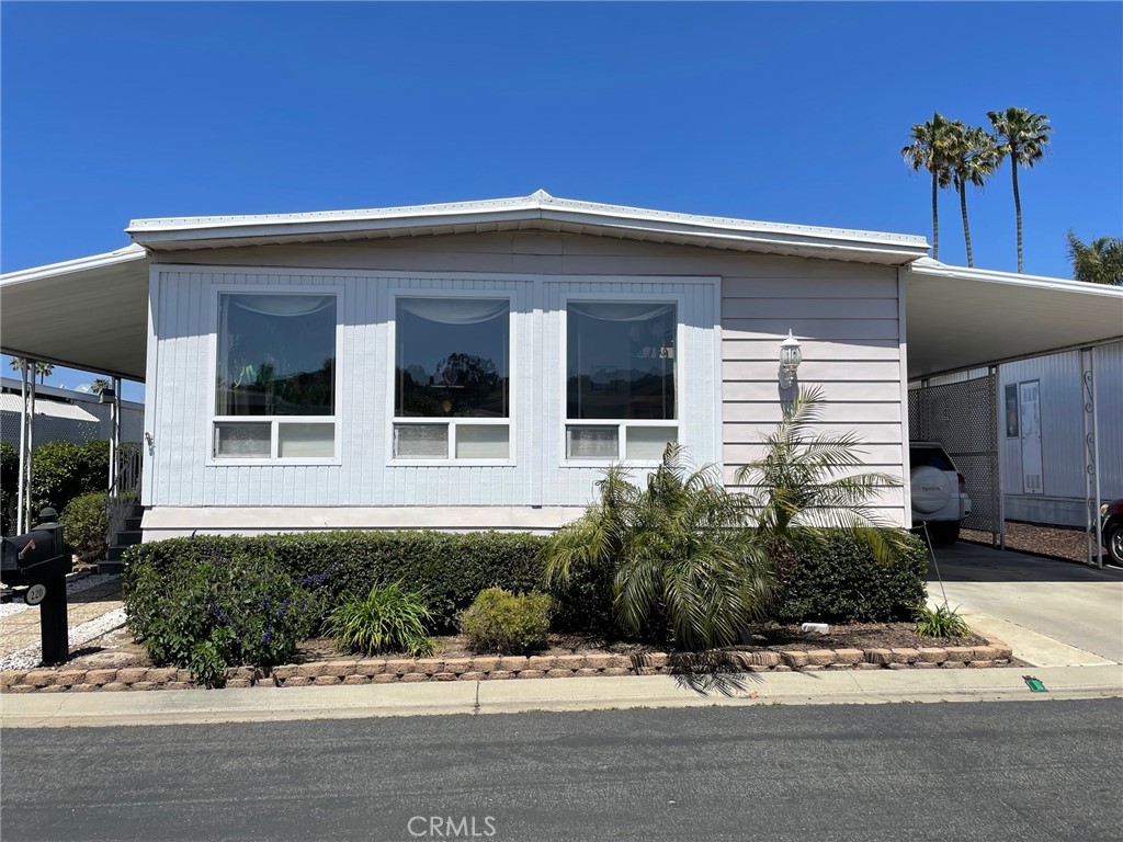 This impressive 2 bedroom 2 bath home is located in this premier rent controlled senior community. The spacious living room provides tons of natural light and the large dining room includes a lovely built in buffet perfect for displaying all of your treasures. Beautiful kitchen has a skylight and plenty of cupboards and counter space. The den is ideal for a home office or watching your favorite TV shows. Oversized master suite includes two closets. Numerous features include dual paned vinyl windows, fans, skylights, newer roof, water heater, furnace and air conditioner. Pick lemons and oranges from your own trees. Low, low space rent enables you to experience the joy of living by the beach! Stroll though historic San Juan Capistrano and enjoy great restaurants and shops. Please call today for your private showing.