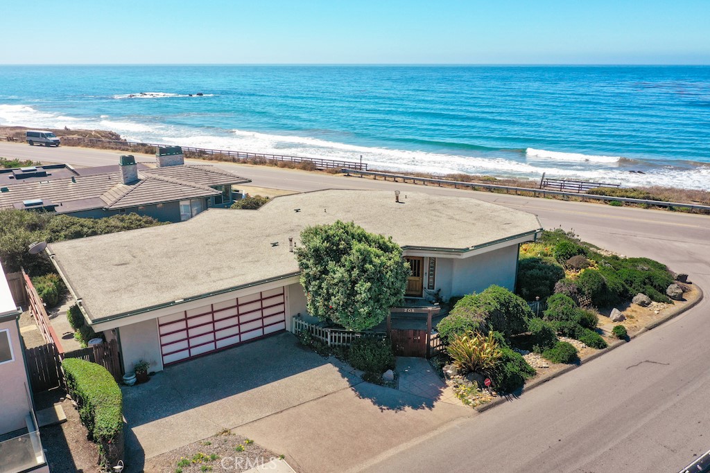 This is the dream house, in the dream location, where dreams and reality merge by endless sunsets. Here is where confort and style meet for an exceptional enjoyment. First time on the market !!!
The main floor welcomes you in the living room with incredible ocean views. The elegant kitchen features high end appliances and granite countertops. Next to the living room, you will find the well designed primary bedroom with an ensuite bathroom and walk in closet.
The laundry room, powder room and oversized 2 car garage are also conveniently located on the main floor.
Downstairs, you will find 2 guest bedrooms, 1 bathroom, a man cave and 2 additional storage rooms.
This one-of-a-kind, custom built property is located just steps from the beach, Moonstone Beach board walk and Leffingwell Landing State Park. Call today for more information.