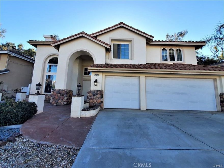 Welcome to the MONSERRAT CLASSICS, a Beautiful 5 bedroom 3.5 Bath Home in central Murrieta. This house has a 1st-floor 2nd master suite with a walking closet, also the 2nd floor has a main Master suite plan. The main level offers a spacious entry with High vaulted ceilings into the formal living/dining combo with a w/elegant fireplace with laminate wood floor and tiles. The family room offers a cozy fireplace, and media niche, all open to the kitchen which is perfect for entertaining. The kitchen features a large center island, granite counters, built-in appliances, and plenty of storage space with maple cabinetry. The main floor master is a very generously sized bedroom with a true master private bath complete with a separate tub and shower, dual sinks, and a large walk-in closet. The main level also features a 1/2 bath (powder bath) for guests. The 2nd level offers a large loft/bonus room with a w/balcony overlooking the backyard and reserve. 3 secondary bedrooms all large and in size share a hallway bath. The Master suite offers a high ceiling, a large walk-in closet, a master bath with w/dual sinks, an upgraded spa bathtub, and a shower. Custom landscape-stamped concrete courtyard/patios. Backyard offers NO REAR NEIGHBORS and backs the nature preserve featuring walking trails and beautiful trees adding tons of privacy to this backyard space. Double-gated side yard perfect for dog run. Low tax and no HOA! Centrally located between the 15 & 215 freeways Minutes to shopping, Walk to Parkway & award-winning schools.  Must-see!