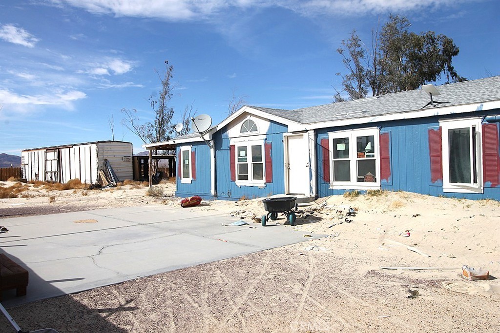 Nestled in the heart of the open desert, this spacious 5-bedroom, 2-bath home offers a unique opportunity for those who crave privacy and are not afraid of a little hard work. With its expansive views and serene surroundings, this property is perfect for anyone looking to escape the hustle and bustle of city life. As you approach home, you'll be greeted by the vast, unspoiled landscape that stretches as far as the eye can see. The exterior, while in need of some TLC, boasts solid bones and endless potential. Step inside to discover a generous floor plan filled with natural light, allowing you to envision your personal touch in every room. The five bedrooms provide ample space. while the two bathrooms offer convenience. The open-minded area invites creativity and customization, making it easy to create a welcoming atmosphere for gatherings or quiet evenings under the stars. This property is priced to sell as-is, making it an excellent investment opportunity for those willing to put in the effort to transform it into their dream home or a lucrative rental property. With a little vision and hard work, you can capitalize on the tranquility and beauty of desert living. If you’re ready to embrace the adventure of desert life and take on a rewarding project, this home could be the perfect fit. Don’t miss out on the chance to make this unique property your own and enjoy the peace and solitude that only the open desert can provide! This property is on a permanent foundation.