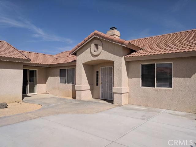 TALK ABOUT A GEM IN THE DESERT!?! This gorgeous 3 BR 2 BA with an office that could be a 4th bedroom has so much to offer that you must see it! Wonderful, split floor plan,open kitchen dining and family room/formal dining room layout with refinished cabinets, granite tile counters and upgraded Stainless Steel appliances, added pantry. Indoor laundry too! Sellers purchased this home and remodeled it in 2010. New furnace and AC in 2017. Floors are tile except carpet in the bedrooms - and the wood plank'' tile looks like real wood! A dual-sided fireplace with stacked rock is just beautiful! You will love this roomy master bedroom with a remodeled en suite'' and dual closets as well as sinks. Modern neutral colors, Cathedral ceilings and plant shelves add to the architectural beauty of this home. The extra room could be used as an office, or you can turn it into a bedroom if you like. Mostly new windows, and a fabulous private courtyard in the front! Alumawood covered patio in back with extra concrete poured to make a much larger patio! EZ care landscaping with almost zero maintenance. Oversized garage has plenty of space to park that pickup or SUV! New exterior stucco makes for clean and easy maintenance outside, automatic drip irrigation. The back of the house faces East so there is plenty of shade for entertaining on those hot summer afternoons. Silver Lakes is a private community between Victorville and Barstow. Your monthly HOA dues include use of all of the amenities Association Amenities: Beach # of RV Spaces: 0 Special Features: CC,,PTRY,TS,SHPOOL,CLUB,SPA,TENN,GYM,LAKE,BEAC,GOLF Lot Location Type: Standard Location Landscaping: Sprinklers Special Features: Garage Door Opener # of Attached Spaces: 2 # of Detached Spaces: 0
