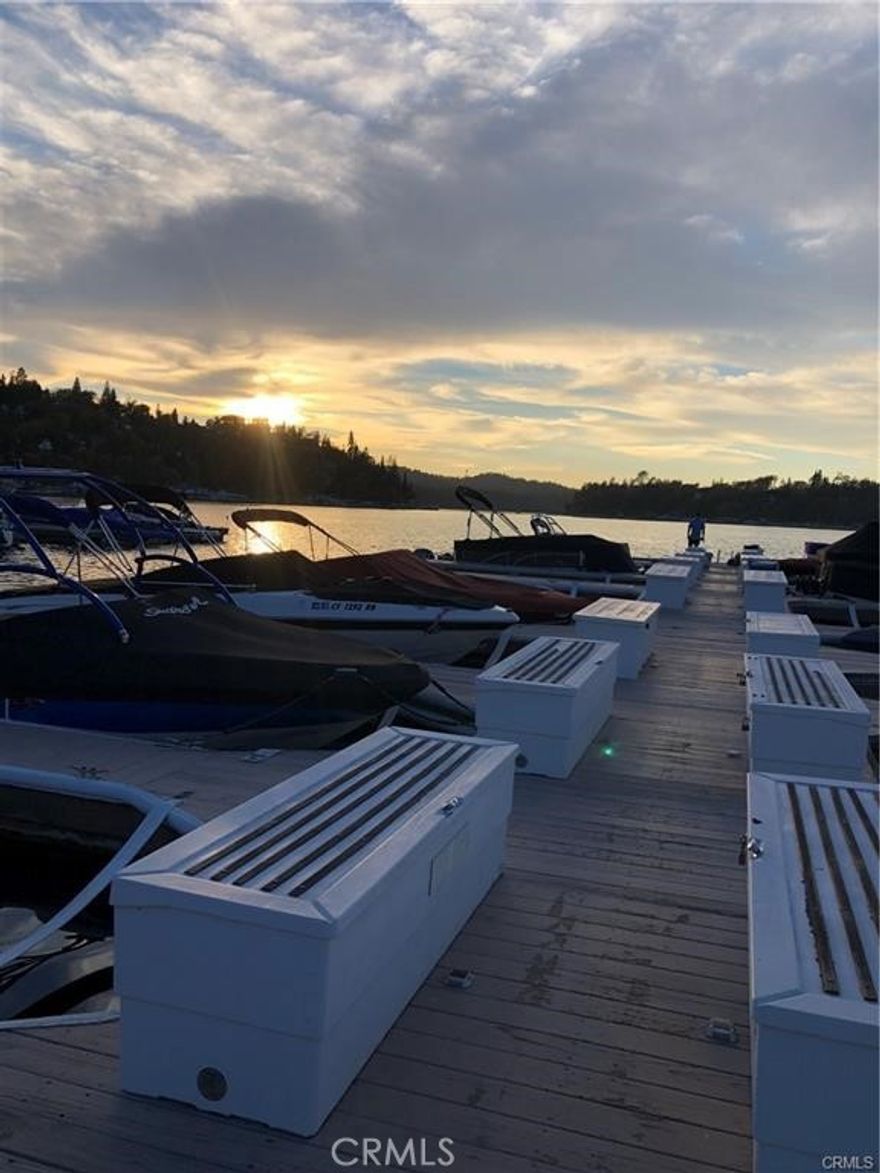 DAM 2 SLIP 6. Parking is available directly in front of the gate, providing effortless access to the BBQ area, complete with a fire pit and tables. The slip can accommodate up to a 24-foot boat, creating a truly enjoyable experience for you and your guests. Boat can be sold too.