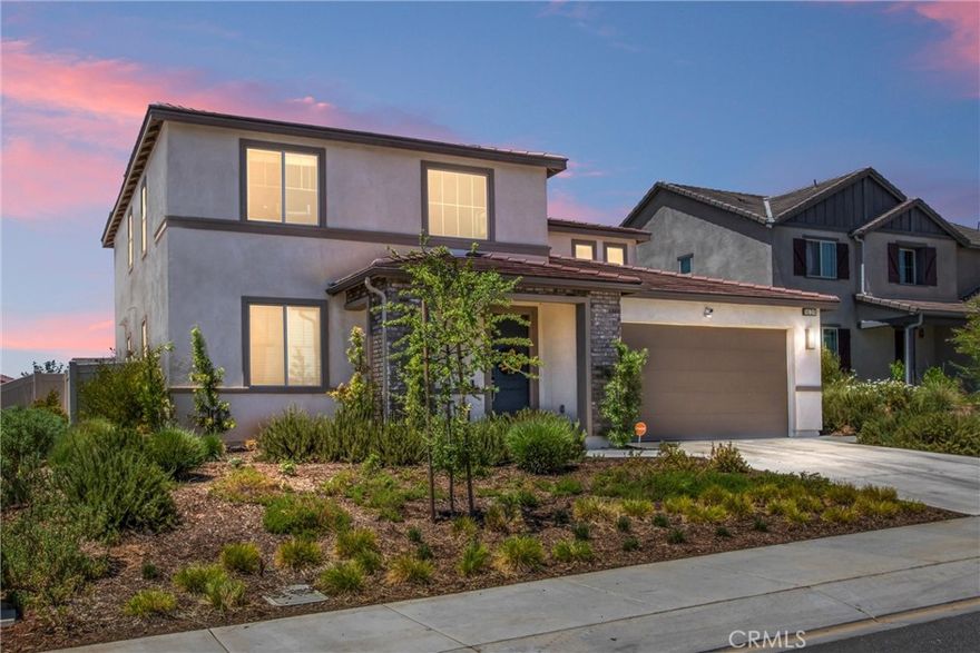 Stop the car...you're entering a 4 bedroom, 3 bathroom nearly newer home in the desirable community of Atwell. The front yard has been landscaped to allow for water efficiency. The home boasts of an expansive open-concept kitchen and family room, ideal for gatherings and everyday living. The lower level also features a full bathroom and down stairs bedroom. A gorgeous kitchen with beautiful cabinetry, stainless steel appliances including a microwave, dishwasher, and range/oven and a walk in pantry for your convenience. A large island provides additional eating options, while allowing for cooking, serving, entertaining while still engaging in the conversations taking place in our family room. As we go upstairs, three additional bedrooms are awaiting you. Including the primary bedroom and bathroom with walk in closets, lovely countertops and a welcoming shower. For your convenience the laundry room is also upstairs. The home also features a tankless water heater and PAID Solar. The backyard is the perfect place for relaxing and unwinding. The backyard has been meticulously designed. Look to the right corner of the backyard, there is the waterfall for the community. You can hear the water ... it's relaxing and refreshing, right in your own backyard. Other HOA amenities include a large swimming pool, playground, walking trails, waterfalls, fishing, etc. The home is minutes from schools, parks, eateries, and the freeway. This is a MUST SEE home.