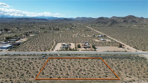 Photo of 0 Old Woman Springs Road, Yucca Valley, CA 92285 (MLS # JT24040105)