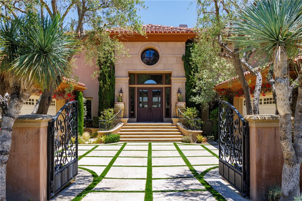 Located in the prestigious gated/guarded Pelican Ridge community, on a single-loaded cul-de-sac street, with breathtaking views of the rolling hills, this exceptional estate makes a dramatic first impression with its grand entrance, double foyer, spiral stairs, and floor-to-ceiling windows and doors. With 4 bedrooms (one bedroom is downstairs), 4.5 baths, a living room, a family room, an office, and a media room, spanning over 5,900 SF, it offers ample spaces for elevated living and entertaining experiences. The primary suite with a generous sitting area boasts a panoramic canyon view. The backyard designed by a French landscape architect features a pool, patio with fireplace, and BBQ, all surrounded by lush greeneries, all with the rolling hills and the ocean as the background. With no neighbors in the front and back, it offers plenty of privacy and peacefulness. Walk to the beach, and minutes away from Pelican Resort, freeways, shopping centers, Sage Hill high school, and other public schools, it offers the ultimate luxury living convenience. You have to come to see it to appreciate it. This is truly an opportunity to create your own finest California coastal living experience!