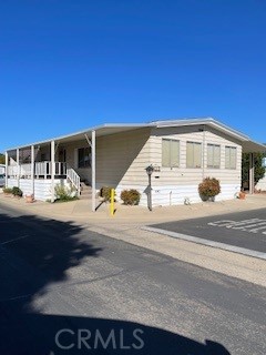 This extremely well maintained 3 bedroom/2 bath mobile home in the desirable Casa Del Rio Park is conveniently located close to the 101, Marian Hospital, dining, and shopping. The home has newer carpet and an easy flow floor plan with large dining area, living room with a gas fireplace and family room/office area. The indoor laundry is handily located off the kitchen. There is a shed for extra storage located at the end of the carport which can easily accommodate 2 cars and guest parking is right next door! Relax on the large front porch and enjoy the fresh air & low maintenance yard. Call your favorite Realtor today to view this gem!