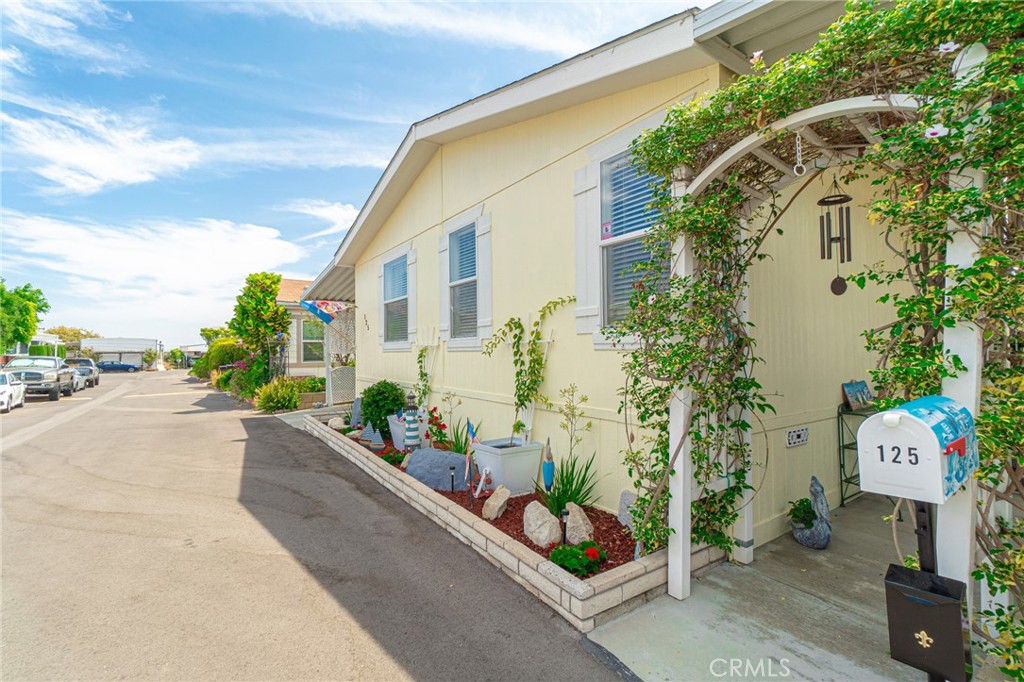 Family Park, Pet Friendly, Amenities-Clubhouse, Outdoor Swimming Pool, BBQ Area, Billiards, Doggie Bag Stations, Car Wash! Located on a hill in the Harbor Pines section of Harbor City across from Rolling Hills Preparatory School and Marymount College, nice area, great park! This is a large home almost 1600 square feet of living space. Three bedrooms one is a Master Bedroom with Master Bath. When you enter this home from the front porch you will see the very spacious living room open floor plan with combined dining room area and Kitchen with a peak a boo pass through section. Plenty of space in the Kitchen for cooking with included GE appliances Refrigerator, Dish Washer and free standing Oven/Range and lots of cabinets. Laundry room includes new washer GE and newer dryer Kenmore. There are added cabinets in the Laundry Room for storage. Master Bathroom has separate shower and jetted soaking tub. Extra cabinets were installed in the Master Bathroom for extra storage as well. Master Bedroom is large with huge walk in closet with three tiers of shelving for clothes and accessories. Two bedrooms with sliding closet doors located on the other side of the home which are very spacious rooms. Hall bathroom with combo tub/shower and also very spacious. There is a hall closet for additional storage. This home is huge if you want plenty of room and storage. On the outside of the home there is a three car covered awning in the driveway and large shed which has finished walls and ceiling with drywall. On all exterior sides of the home there are planters and beautiful landscaping. Other features this home offers are vaulted ceilings, two inch vinyl blinds, high end carpeting, the living room has a Dormer window, the Kitchen has a skylight, ceiling fans in the dining room and all bedrooms, Central Heat and Air Conditioning, privacy lattice on the front porch and driveway areas, three Arbors two on the West side and one on the East side. This park is centrally located near Rancho Palos Verdes, San Pedro, and Torrance areas for shopping, restaurants, and entertainment. Eight miles to the West is Torrance/Redondo Beach, three miles to the South is the Ocean. Close to the Harbor Frwy 110. This home is a must see! Come see.