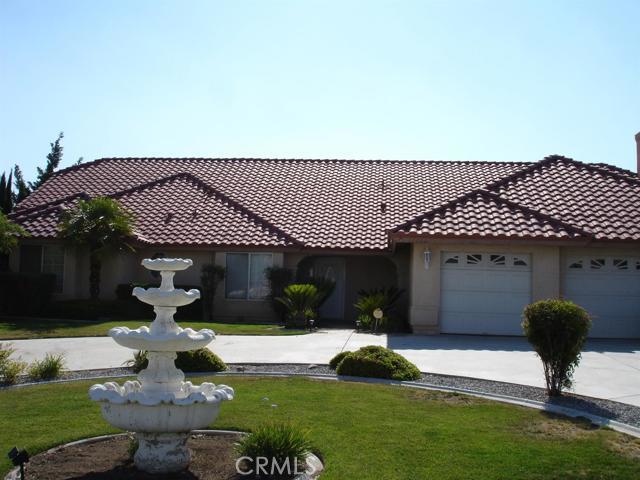***REDUCED $20,000!***GREAT APPLE VALLEY HOME ON A BEAUTIFUL STREET IN AN ESTABLISHED NEIGHBORHOOD IN DESERT KNOLLS!!***4 large bedrooms, 2.5 baths, 24 inch tile floors in the high traffic areas. Large, stuccoed ceiling back patio with fully fenced-cross fenced yard. Vaulted ceilings throughout, ceiling fans, skylights. Granite on the kitchen counters AND bathrooms. Stainless steel appliances, double oven and preparation island, eating bar. Open living room, family room with dining area and nook. Lots of windows and natural light upper windows. Nice master bedroom with large master bathroom featuring soaking tub and separate shower, along with walk in closet. Dual sinks in both main bathrooms. Nice half bath and large indoor laundry room. Fireplace in the family room adjacent to the kitchen. Beautiful front yard landscaping with fountain and circular driveway leading to the finished 3 car garage. Newer Tile roof and lots of mature palm trees! One of the best locations you'll find! Association Amenities: None # of RV Spaces: 0 Special Features: ,PTRY,WSEC,SK,NONE Lot Location Type: Standard Location Special Features: Garage Door Opener, Underground Util: # of Attached Spaces: 3 # of Detached Spaces: 0