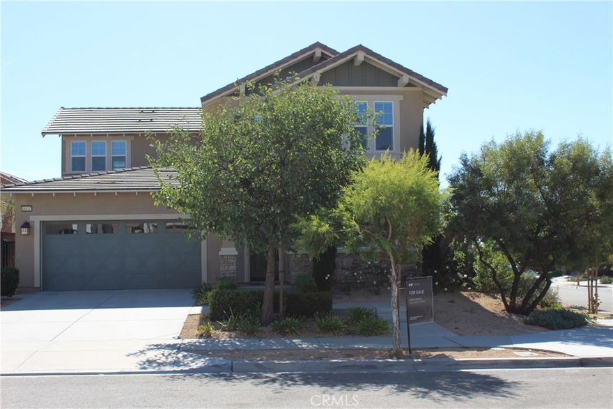 Former Lennar Model! This beautiful upgraded corner 2 Story residence boasts an open floor plan design with dual pane windows, upgraded flooring and recessed lighting for modern living. Featuring four spacious bedrooms, a guest bedroom and full bath downstairs. The modern kitchen features granite countertops, a large island and modern appliances. The Owner's Suite includes two separate walk in closets for her and him. The large upstairs loft offers an ideal space for family retreat or a cozy retreat. Enhancing its appeal, the home is energy efficient with solar panels, a tankless water heater and a quiet cool whole house fan. The garage has epoxy flooring including a Tesla car charger along with storage. Residents are treated to an array of a park, tot lot, dog park and basketball court with NO HOA. Close to attractions, shopping, and dining at Falcon Ridge Town Center, Sierra Lakes MarketPlace, and Sierra Lakes Golf Course. Discover a lifestyle of convenience and luxury at The Arboretum.