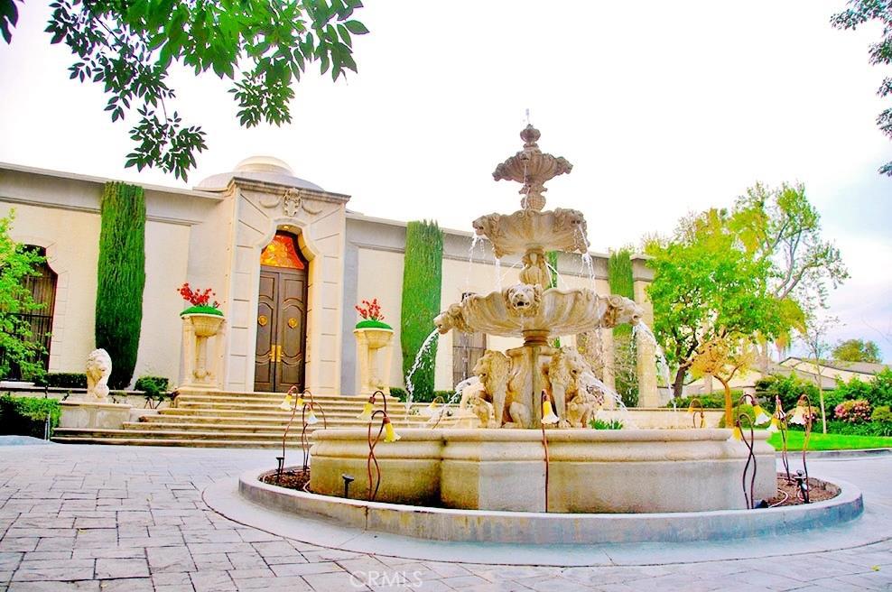 Location! Location! Luxurious Residence. Across the street from the main entrance to the Renowned Huntington Library. Walking distance (3 short blocks) to The California Institute of Technology.. Caltech.. Charming French Contemporary style, built in 1976. Gated Luxury Residence with a circular driveway and a magnificent centered Lion Fountain. This is one of a kind home! Grand Foyer with stained glass Cupola. Grand Formal living room, Grand Formal dinning room, gourmet kitchen. Breathtaking Greco-Roman center Courtyard with pool, spa and sauna. 3 bedrooms downstairs and 4 bedrooms upstairs. Come enjoy the spacious Master suite with it's Opulent Greco-Roman Master Bath. Clubhouse situated by the pool and barbecue area. Lighted tennis court with cabana.