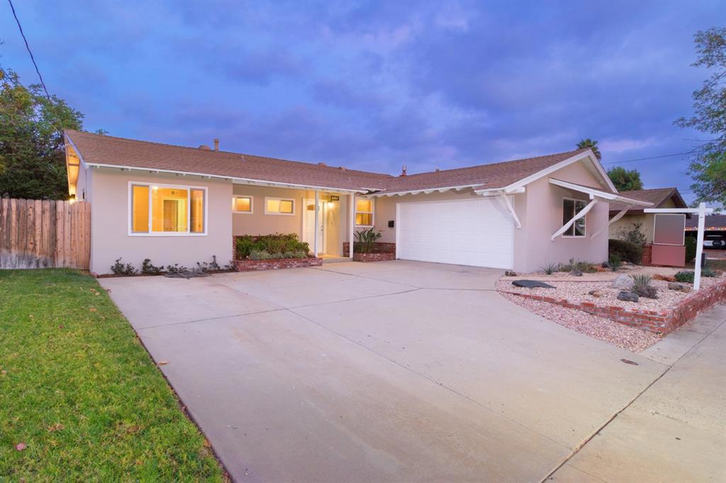 This charming single-level home has undergone a variety of renovations including all new carpeting and windows, newer appliances and brand new cherry cabinets in the gourmet kitchen. Both the exterior and interior of the home have been freshly painted. Additionally, both bathrooms have been completely upgraded with brand new cabinetry and new counter tops. You will love the great natural light and sleek hard surface flooring throughout making this home open and inviting to all. This home boasts a huge and grassy backyard perfect for entertaining your guests or spending the day outside. The backyard also has various fruit trees such as orange, lime, pear, tangerine and avocado! Call Wayne today at (619) 244-5251 to view this home! Refrigerator, Dishwasher, Stove, Washer and Dryer Included! Neighborhoods: College Ranch