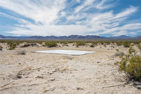Photo of 7600 Morning Star Road, 29 Palms, CA 92277 (MLS # JT23077574)