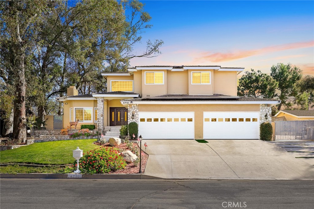 Location! Location! Location! Nestled in the hillside community of Live Oak Canyon in La Verne, this fully upgraded luxury estate seamlessly blends modern comfort with breathtaking natural scenery. Located in a well-maintained and peaceful neighborhood, it offers an ideal living environment.
The home has been completely renovated with an elegant and sophisticated style, creating a warm and refined ambiance. Step through the grand double-door entrance into a soaring, spacious foyer, where a magnificent chandelier and curved staircase immediately showcase the grandeur of this estate. The open-concept living and dining area enhances the home's welcoming atmosphere, perfect for entertaining.
The fully upgraded open kitchen features exquisite granite countertops, high-end finishes, and a functional yet stylish design. Connected to the family activity area and breakfast nook, this layout fosters warmth and togetherness. In winter, gather around the cozy fireplace, or enjoy drinks at the bar while singing and admiring the view of the expansive backyard—an ideal setting for cherished family moments. Additionally, the first floor includes a private study, laundry room, and powder room to meet all daily needs.
Upstairs, the luxurious and romantic primary suite features a fireplace and a private terrace overlooking the pool and lush gardens. The upgraded, sunlit en-suite bathroom boasts dual walk-in closets, double vanities, a brand-new soaking tub, and a separate shower, offering both elegance and functionality.
The backyard is a true retreat, complete with a sparkling pool, a relaxing spa, and a spacious shaded patio, all surrounded by mature landscaping to create a private and tranquil oasis. A high-efficiency solar system reduces energy consumption, ensuring an eco-friendly and sustainable living experience.
The oversized 4-car garage provides ample parking and includes a loft for additional storage. Ideally located just minutes from the prestigious Webb Private School, golf courses, shopping centers, and commercia!!!