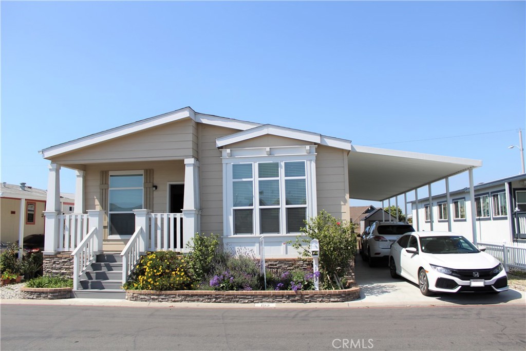 Welcome to a NEW, bright and warm mobile home located in Central of Little Saigon. New home with 3 bedrooms, 2 bathrooms, 1,511 sqft living area, open floor plan: Large and bright living room, next to a Beautiful open kitchen with quartz countertops, big island and stainless steel appliances. Large formal dining area. Wood floor through-out, Dual pane windows, Laundry area. 3 carport space. Family park with a clean and nice neighborhood. Convenience location that can walk to supermarkets, restaurants, stores and shopping centers. Sale included refrigerator, dryer and washer.