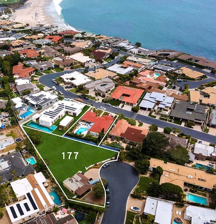 Introducing a Rare Opportunity to Create Your Dream Home on a Nearly 1/2 Acre Flat Lot on the Ocean Side of PCH!
Nestled in the exclusive oceanfront neighborhood of Monarch Bay in Dana Point, California, this remarkable property presents an unparalleled opportunity to craft your coastal dream home. Dana Point is located between Los Angeles and San Diego on the California Riviera.
This exceptionally large lot provides ample space to bring your architectural dreams to life. Whether you envision a modern masterpiece, a Mediterranean oasis, or a traditional coastal estate, the canvas is yours to design. Perfect for outdoor / indoor living. This unique property was originally going to be a compound, including 3 contiguous homes with a common park-like setting for the family. This particular lot had a 5,000 square foot house with a pool/spa that has since been torn down but still includes a 3 car garage on a private cul-de-sac with its own entrance.
Monarch Bay is renowned for its pristine oceanfront setting, and this property is no exception. Situated within steps of the glistening Pacific Ocean, you'll enjoy breathtaking sunsets, refreshing sea breezes, and the soothing sound of waves crashing on the shore.
Monarch Bay residents enjoy exclusive access to the private Monarch Bay Beach Club. Immerse yourself in a world of luxury with fine dining, a well-appointed bar, and a calendar of exciting summer events. The club also provides beach chairs, umbrellas and towels, making every beach day a breeze.
Monarch Bay is a guard-gated community, offering unparalleled security and peace of mind. It's a neighborhood characterized by its opulent homes, manicured streets, and a strong sense of community.
Beyond the gates of Monarch Bay, Dana Point offers a charming coastal lifestyle. Explore the Dana Point Harbor, known for its water sports, dining, and entertainment options. The city is also home to world-class resorts, golf courses, and a vibrant arts scene.
Don't miss the chance to transform this expansive lot into your coastal masterpiece, where you can live the ultimate California dream. Create a legacy in a neighborhood that defines luxury living by the sea.
Seize this rare opportunity to build your vision of paradise in Monarch Bay. Contact us today to schedule a private viewing and explore the endless possibilities that await you in this prestigious oceanfront community. Your dream home on the California coast awaits!
