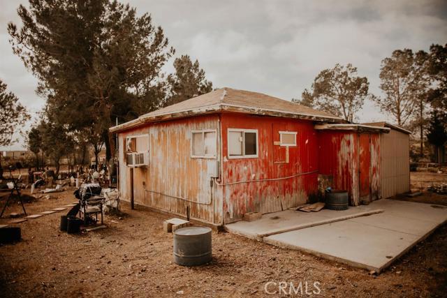 Bring your toys, your animals or your green thumb to this TINY HOUSE oasis in the desert. If your looking for a getaway or some space to live off the grid, this property will accommodate. Complete with a newer well, city power and 10 acres of picturesque, all useable desert landscape where only the only limitation is your imagination.