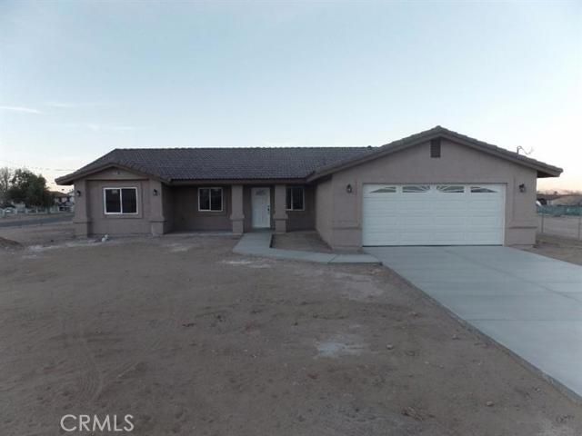 Here is a brand new beautiful 1,700+ sqft home set with amenities to die for. Everything in this house is top quality and includes: stainless steel appliances, granite counter tops throughout kitchen and bathrooms, large pantry, 20 inch tile floors, Kitchen island with breakfast bar, master bath with separate tub/shower and dual sinks, stone faced fireplace, oil rubbed bronze light fixtures, ceiling fans in all bedrooms and living/family rooms. This house sits on a huge .66 acre lot and is pre-wired for a security system, has an over the range microwave, tile roof, Large rear patio, covered front entrance, Fire sprinklers, indoor laundry, and much more! Come see for yourself! Association Amenities: None # of RV Spaces: 0 Special Features: CC,PTRYNONE Lot Location Type: Standard Location # of Attached Spaces: 2 # of Detached Spaces: 0