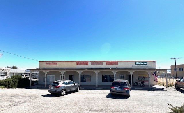 **Commercial Zone C-2** Situated in the heart of Victorville’s most dynamic district, this prime commercial property, built in 1980, comprises four spacious units. Fully occupied by long-term tenants at below-market rents, it presents significant upside potential. The property sits on approximately half an acre along a major road, offering ample parking in the rear and excellent access to Highway 15.