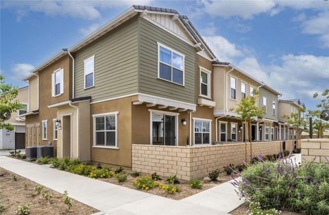 Photo of 22952 Harvest Mill Circle #18, Saugus, CA 91350 (MLS # SR24050658)